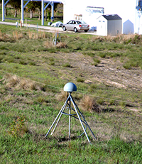 GODN GNSS antenna and dome on tri-brace monument
