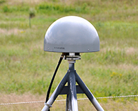 GODS GNSS antenna and dome on tri-brace monument