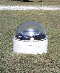 The GODE monument with Dorne-Margolin antenna and radome.