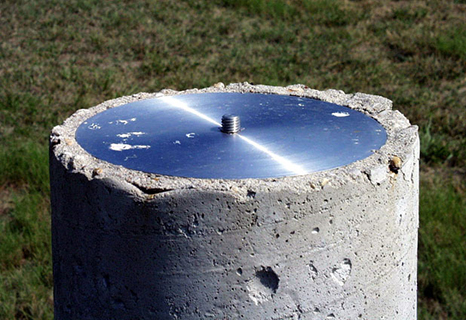 A close-up view of the reference monument shown in the photograph to the left.