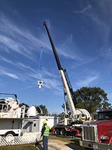 GMS being lifted by a crane