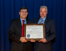 Project Manager, Stephen Merkowitz, aceepting the Robert H. Goddard award for Exception Achievement for Engineering Team on behalf of the Space Geodesy Project Team